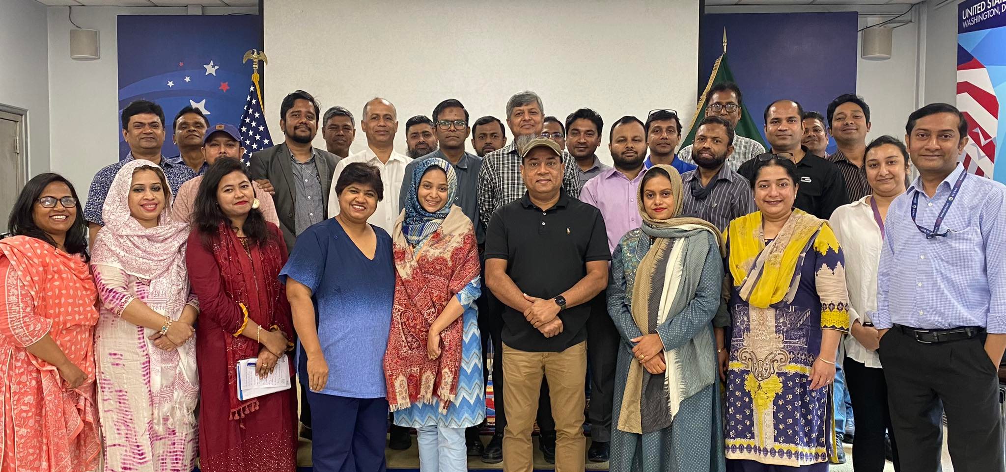 Zia Hasan with participants at a professional workshop